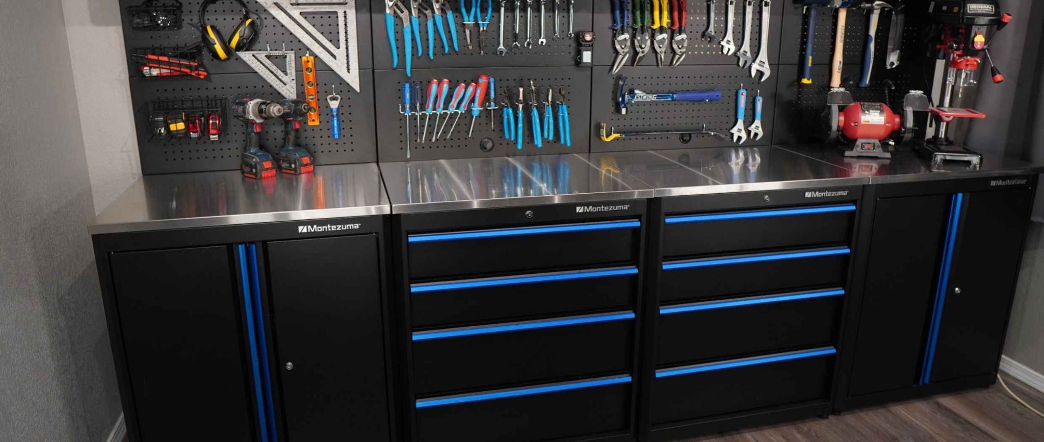 Montezuma garage cabinets and stainless-steel worktops in a working workshop